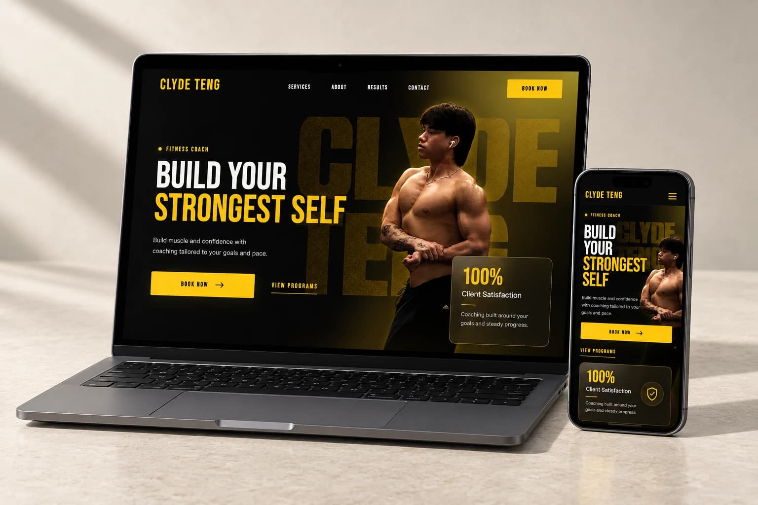 Clyde Teng Fitness’s black and yellow coaching website presented on a laptop and phone in a light stone studio